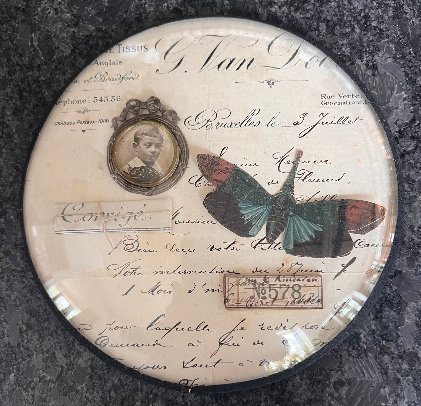 French Round Ephemera Collage – Glass Framed Wall Art with Portrait & Insect Motif, 7.5”