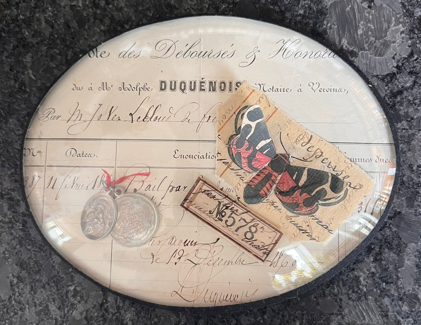 French Oval Ephemera Collage – Glass Framed Wall Art with Medals & Insect Motif, 7”