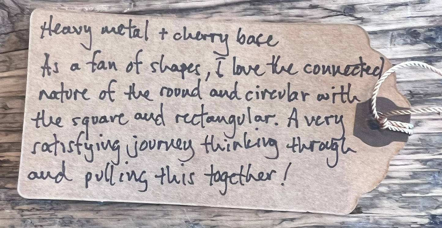 Bob Grosse - sculpture heavy metal & cherry base